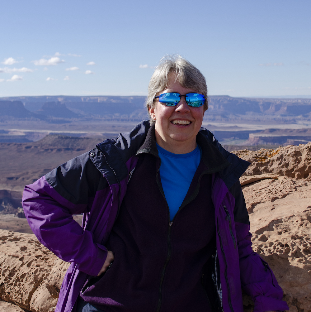 a photo of Laurie Anderson standing outside in Moab, Utah, in 2018